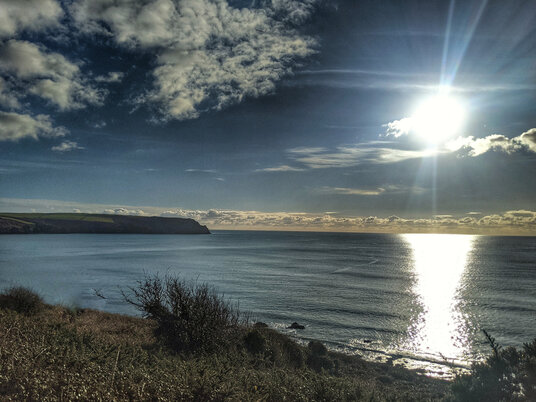 View over the bay at Pendower Beach