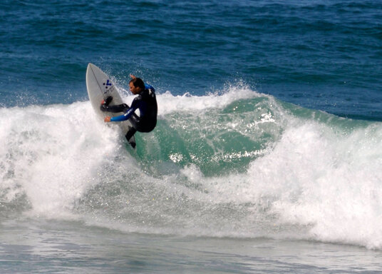 Surfer at Constantine Bay