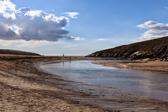 The River Gannel crossing Crantock Beach