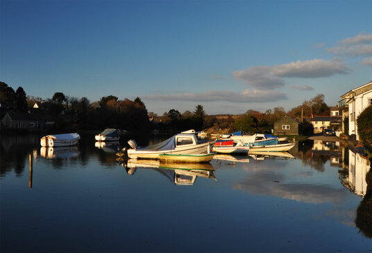 The creek-side car park on a high tide