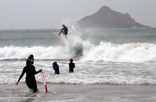 Surfing at Lundy Bay