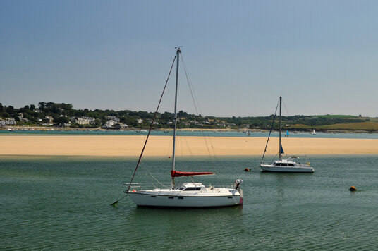 Boats moored outside the harbour