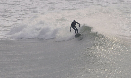 Surfer at Polzeath