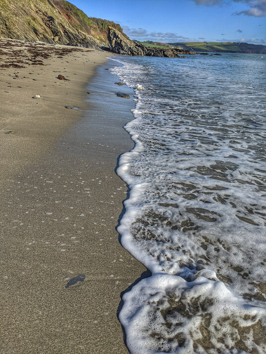 View along Porthbean Beach