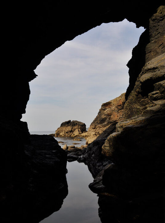 View looking out of the cave at Porthcothan