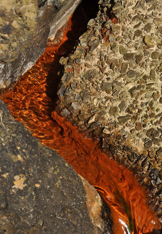 Iron-rich water draining from the mines