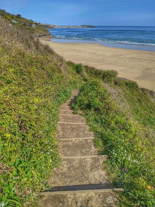 Coast path alongside Porthkidney Sands