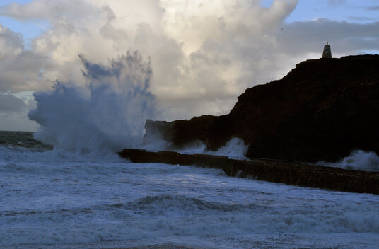 Storm waves breaking on the pier