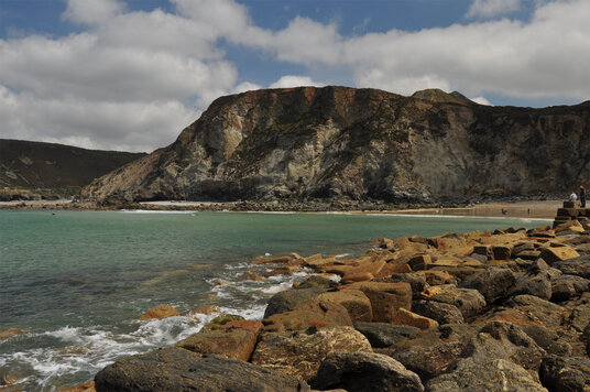 Remains of the harbour wall on Trevaunance Cove