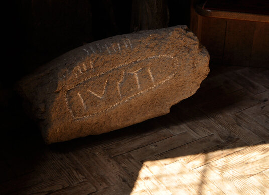 Stone in the church inscribed with Ogham