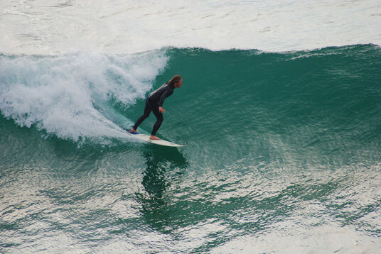 Surfer at Trebarwith Strand
