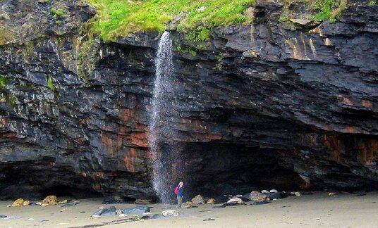 Waterfall on Tregardock beach