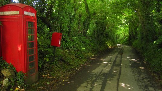 Old phone box and post box on lane near Trewalder